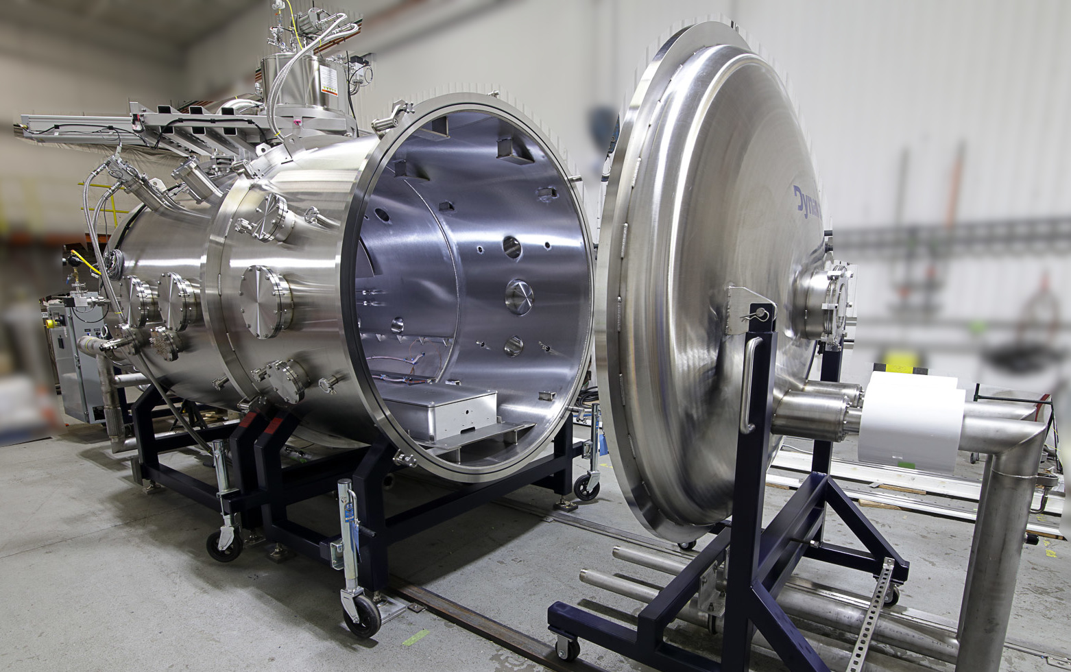 Dynavac EPT/TVAC system, This space simulation chamber is designed for electric propulsion testing and thermal vacuum testing. It is essential to testing spacecraft in a realistic space condition.
